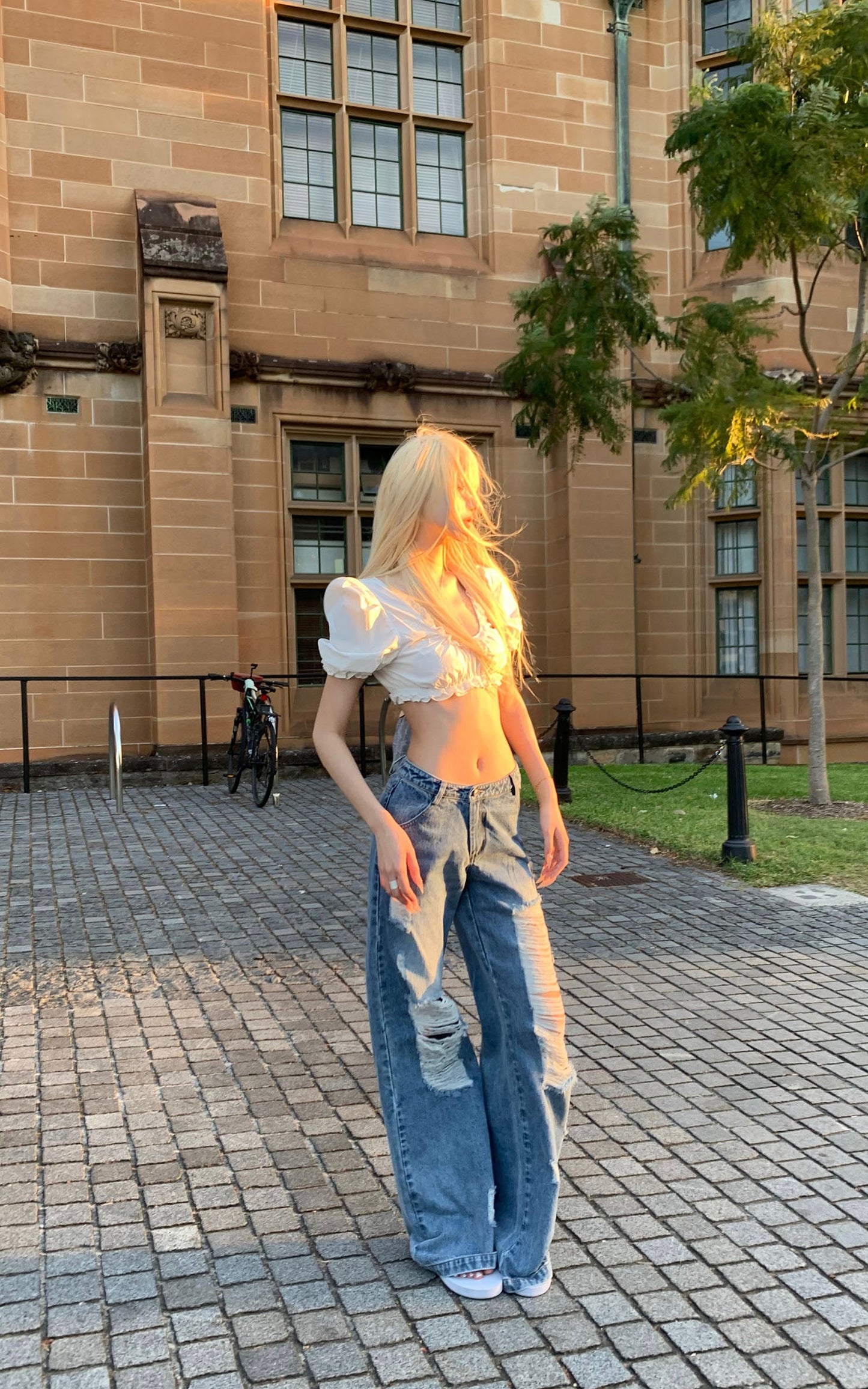 Distressed Wide-Leg Washed Denim Jeans