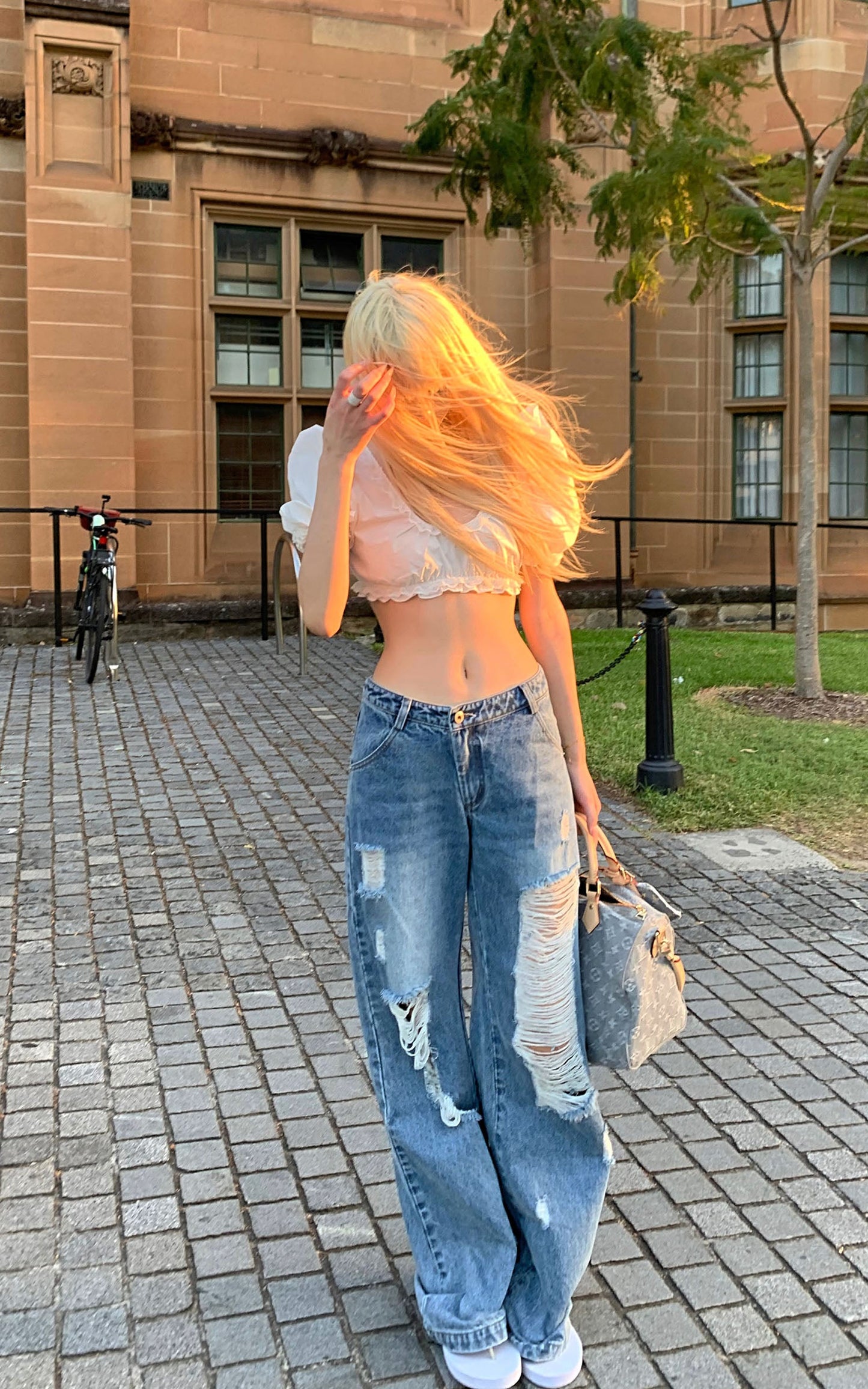Distressed Wide-Leg Washed Denim Jeans