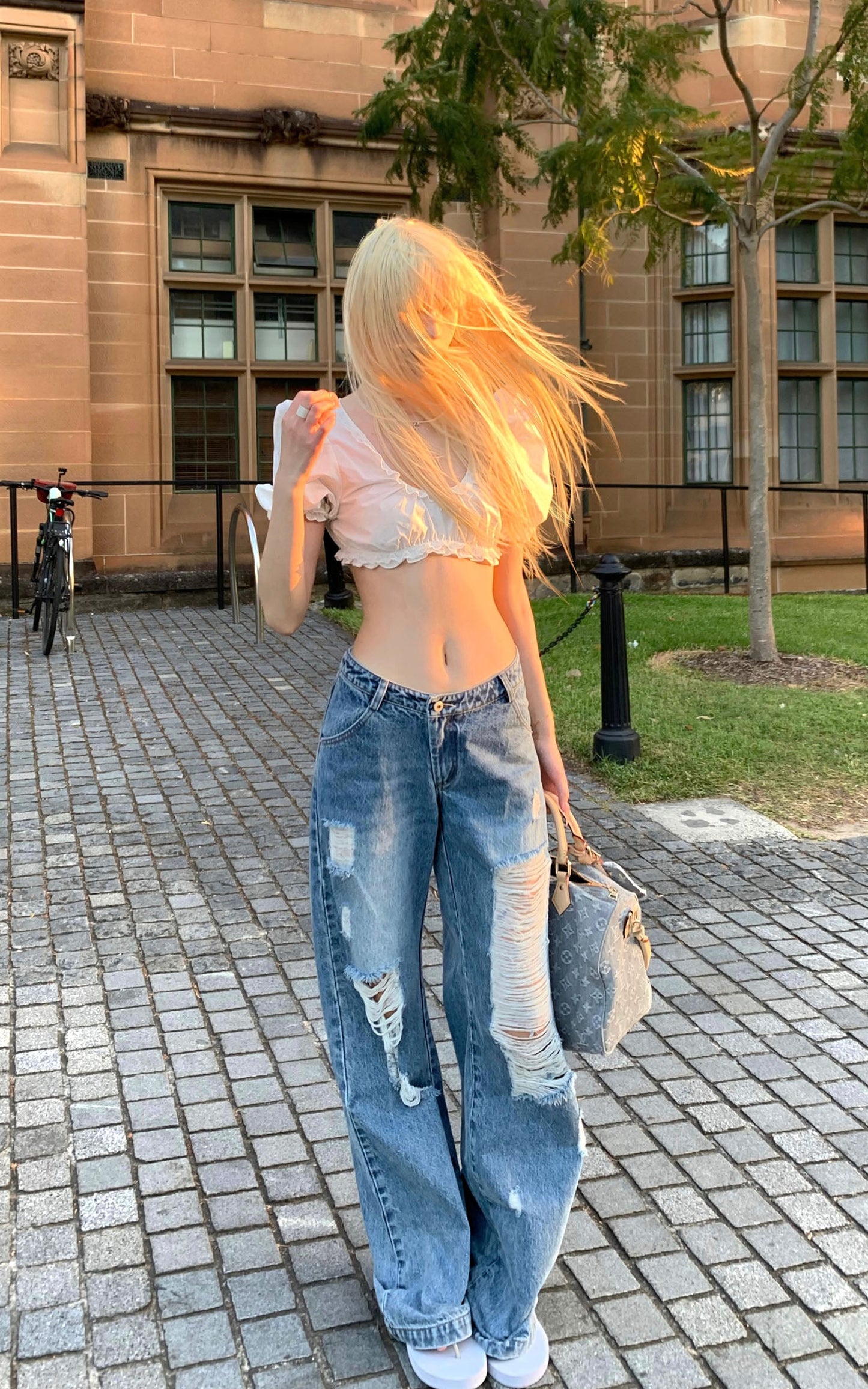 Distressed Wide-Leg Washed Denim Jeans