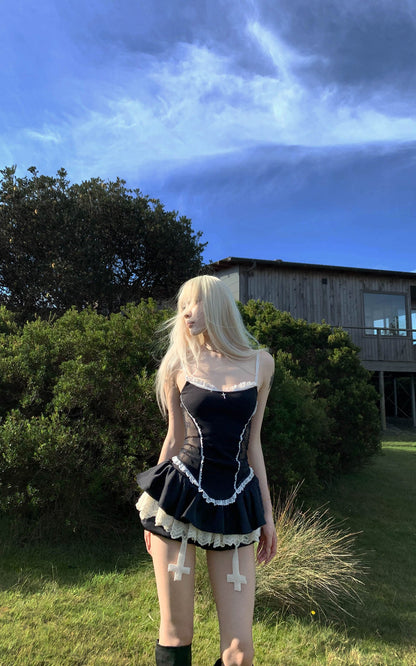 Lace-Trimmed Vest and Skirt Set with Cross Detail